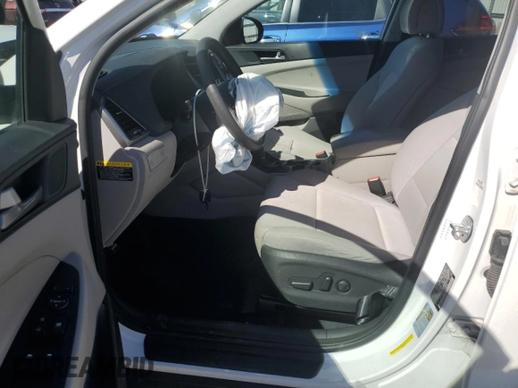 2018 Hyundai Tucson SEL z VIN KM8J33A41JU656096, wystawiony jako Copart lot #47367835 z przebiegiem 96 498 mil mil oraz Szkoda całkowita • Salvage title. Historia ofert i sprzedaży dostępna na DreamBid. Obrazek 7.