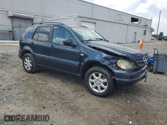 2000 Mercedes-Benz M 320/430/500 with VIN 4JGAB72E7YA168445, listed as a Copart auction lot 59401235 with 231,591 mi miles and Salvage title. Bid and sale history available at DreamBid. Image 4.