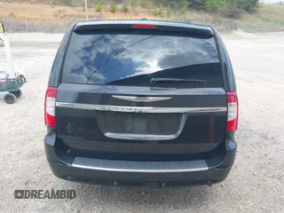 2015 Chrysler Town & Country Touring L with VIN 2C4RC1CG8FR522404, listed as a IAAI auction lot 41932426 with 165,092 mi miles and . Bid and sale history available at DreamBid. Image 16.