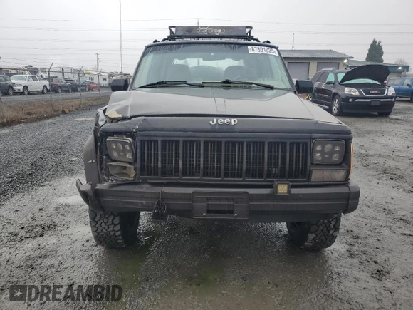 1996 Jeep Cherokee Sport with VIN 1J4FJ68S0TL288244, listed as a Copart auction lot 87801025 with 218,356 mi miles and Salvage Title. Bid and sale history available at carsss.com. Image 5.