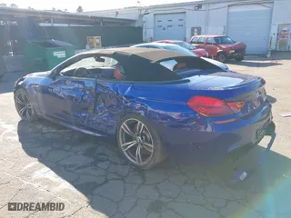 2018 BMW M6 with VIN WBS6G9C56JBM23844, listed as a IAAI auction lot 41206052 with 32,670 mi miles. Bid and sale history available at carsss.com. Image 3.