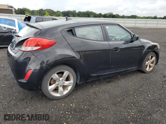 2012 Hyundai Veloster w/Black Int with VIN KMHTC6AD8CU027450, listed as a Copart auction lot 63756415 with 89,037 mi miles and Salvage title. Bid and sale history available at DreamBid. Image 3.