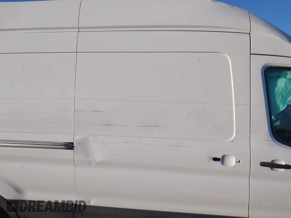 2020 Ford Transit Cargo with VIN 1FTBR1X82LKB80557, listed as a IAAI auction lot 41217513 with 89,774 mi miles and . Bid and sale history available at DreamBid. Image 14.