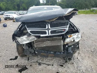 2019 Dodge Journey SE with VIN 3C4PDCBB8KT774151, listed as a Copart auction lot 60909755 with 170,379 mi miles and Salvage title. Bid and sale history available at DreamBid. Image 5.