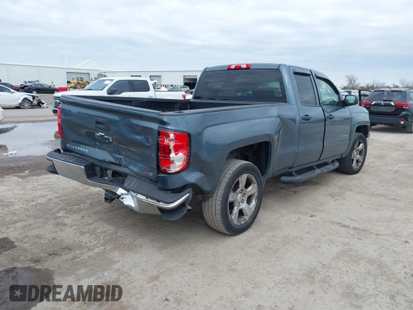 2014 Chevrolet Silverado 1500 LT with VIN 1GCRCREH4EZ296256, listed as a IAAI auction lot 41149836 with 116,955 mi miles and . Bid and sale history available at DreamBid. Image 4.