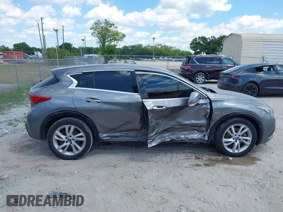 2018 Infiniti QX30 Premium z VIN SJKCH5CPXJA003377, wystawiony jako IAAI lot #41876556 z przebiegiem 91 673 mil mil oraz . Historia ofert i sprzedaży dostępna na DreamBid. Obrazek 13.