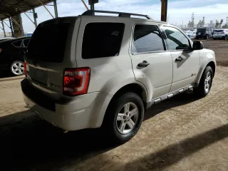 2009 Ford Escape Hybrid z VIN 1FMCU49389KB29641, wystawiony jako Copart lot #51164235 z przebiegiem 131 596 mil mil oraz Szkoda całkowita • Salvage title. Historia ofert i sprzedaży dostępna na DreamBid. Obrazek 3.