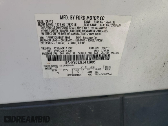 2014 Ford Taurus SE with VIN 1FAHP2D8XEG112805, listed as a Copart auction lot 48975265 with 127,730 mi miles and Salvage Title. Bid and sale history available at DreamBid. Image 12.