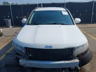 2014 Jeep Compass Latitude with VIN 1C4NJCEB7ED794428, listed as a IAAI auction lot 41995264 with 182,413 mi miles. Bid and sale history available at carsss.com. Image 13.