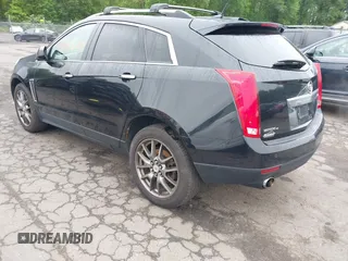 2013 Cadillac SRX Performance Collection z VIN 3GYFNHE39DS642111, wystawiony jako IAAI lot #42470291 z przebiegiem 176 239 mil mil oraz . Historia ofert i sprzedaży dostępna na DreamBid. Obrazek 3.