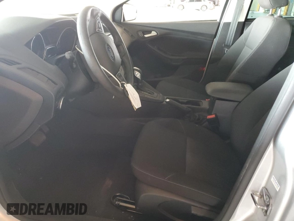 2015 Ford Focus SE with VIN 1FADP3F20FL232196, listed as a Copart auction lot 64829835 with 31,294 mi miles and Salvage title. Bid and sale history available at DreamBid. Image 7.