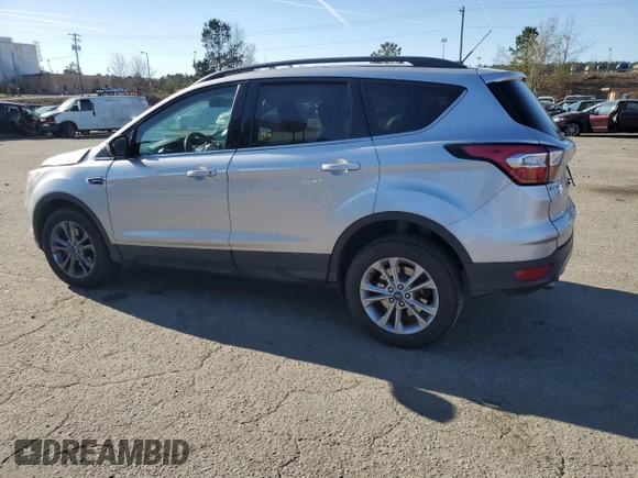 2018 Ford Escape SE z VIN 1FMCU9G96JUB49271, wystawiony jako Copart lot #50553205 z przebiegiem 91 123 mil mil oraz Szkoda całkowita • Salvage title. Historia ofert i sprzedaży dostępna na DreamBid. Obrazek 2.