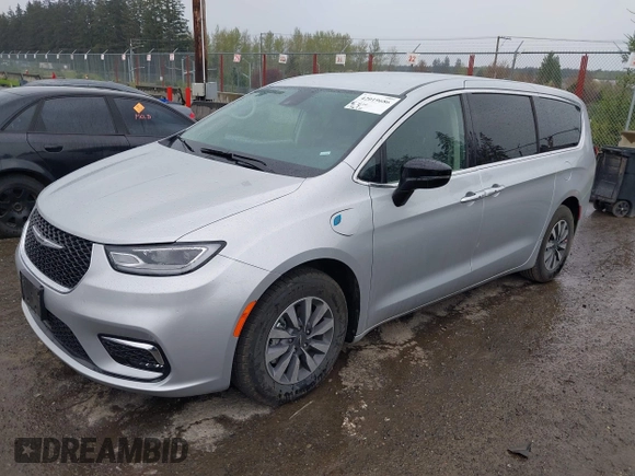 2024 Chrysler Pacifica Hybrid Select z VIN 2C4RC1S71RR141743, wystawiony jako IAAI lot #42019686 z przebiegiem 17 638 mil mil oraz . Historia ofert i sprzedaży dostępna na DreamBid. Obrazek 2.