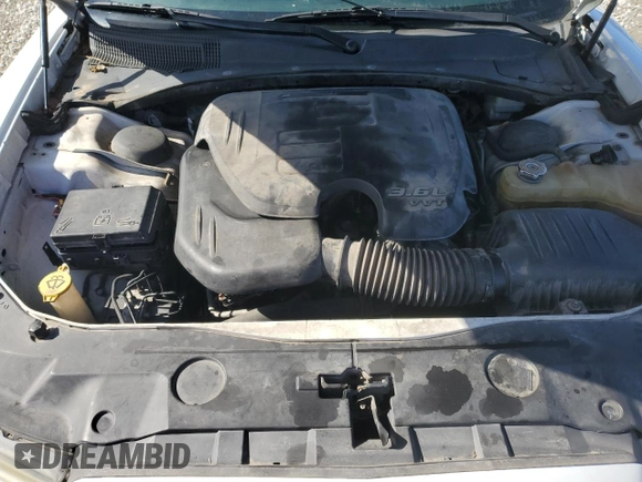 2012 Dodge Charger Police with VIN 2C3CDXAG7CH240124, listed as a Copart auction lot 42676875 with 121,937 mi miles and Salvage Title. Bid and sale history available at carsss.com. Image 11.