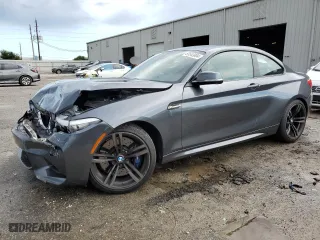 2018 BMW M2 with VIN WBS1J5C58J7B61965, listed as a Copart auction lot 63543004 with 9,663 mi miles and Salvage Title. Bid and sale history available at carsss.com. Image 1.