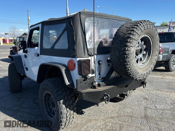 2012 Jeep Wrangler Sport with VIN 1C4GJWAG5CL201499, listed as a Copart auction lot 55247615 with 116,414 mi miles and Clean Title. Bid and sale history available at carsss.com. Image 3.
