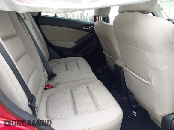 2014 Mazda CX-5 Touring with VIN JM3KE2CY4E0411780, listed as a IAAI auction lot 41903570 with 103,658 mi miles and . Bid and sale history available at DreamBid. Image 8.