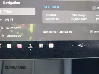 2023 Tesla Model Y Performance with VIN 7SAYGDEF6PF854797, listed as a IAAI auction lot 41319332 with 46,132 mi miles and . Bid and sale history available at DreamBid. Image 7.