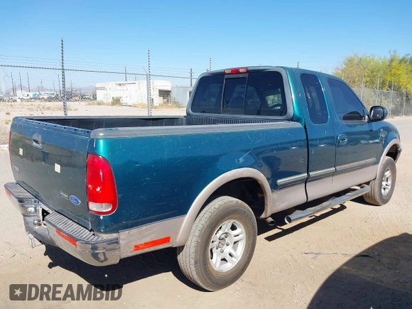 1997 Ford F-150 XL with VIN 1FTEX18LXVKB64986, listed as a IAAI auction lot 41901924 with 224,288 mi miles. Bid and sale history available at carsss.com. Image 4.