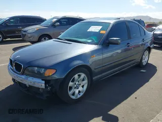 2002 BMW 3 Series 325i with VIN WBAET37482NG74460, listed as a IAAI auction lot 41712972 with 176,762 mi miles. Bid and sale history available at carsss.com. Image 2.
