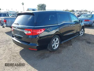 2019 Honda Odyssey EX with VIN 5FNRL6H54KB036540, listed as a IAAI auction lot 42124939 with 135,417 mi miles. Bid and sale history available at carsss.com. Image 4.