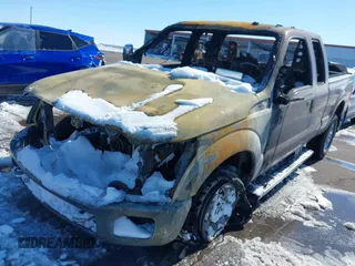 2015 Ford F-250 XLT with VIN 1FT7X2B61FEB60486, listed as a IAAI auction lot 41712104 with 113,228 mi miles and . Bid and sale history available at DreamBid. Image 2.