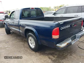 2002 Dodge Dakota Sport with VIN 1B7GL32X12S561414, listed as a IAAI auction lot 42060300 with 235,957 mi miles. Bid and sale history available at carsss.com. Image 3.