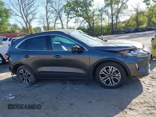 2020 Ford Escape Titanium Hybrid with VIN 1FMCU9DZ2LUA86600, listed as a IAAI auction lot 42059830 with 76,998 mi miles and . Bid and sale history available at DreamBid. Image 12.