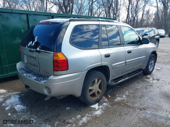 2004 GMC Envoy SLE with VIN 1GKDS13SX42134642, listed as a IAAI auction lot 41715419 with 173,661 mi miles. Bid and sale history available at carsss.com. Image 4.