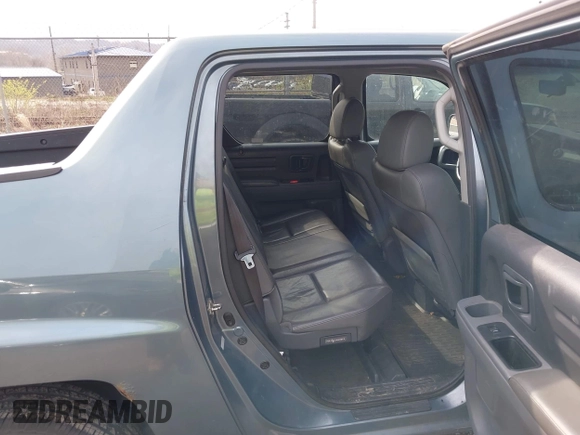 2008 Honda Ridgeline RTL with VIN 2HJYK16528H528826, listed as a IAAI auction lot 42016635 with 128,810 mi miles. Bid and sale history available at carsss.com. Image 8.