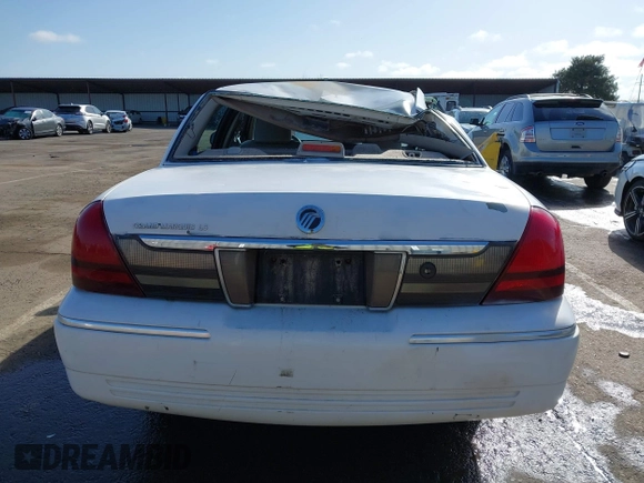2008 Mercury Grand Marquis LS z VIN 2MEFM75V68X647087, wystawiony jako IAAI lot #41936416 z przebiegiem 263 636 mil mil oraz . Historia ofert i sprzedaży dostępna na DreamBid. Obrazek 16.