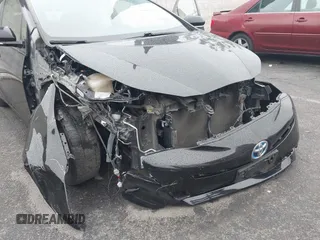 2016 Toyota Prius Four z VIN JTDKARFU4G3005103, wystawiony jako IAAI lot #41807171 z przebiegiem 127 105 mil mil oraz . Historia ofert i sprzedaży dostępna na DreamBid. Obrazek 6.