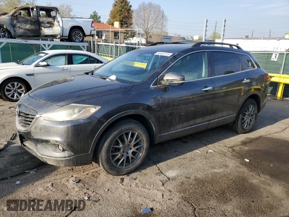 2015 Mazda CX-9 Grand Touring with VIN JM3TB3DV2F0453812, listed as a Copart auction lot 54445115 with 176,067 mi miles and Salvage title. Bid and sale history available at DreamBid. Image 1.