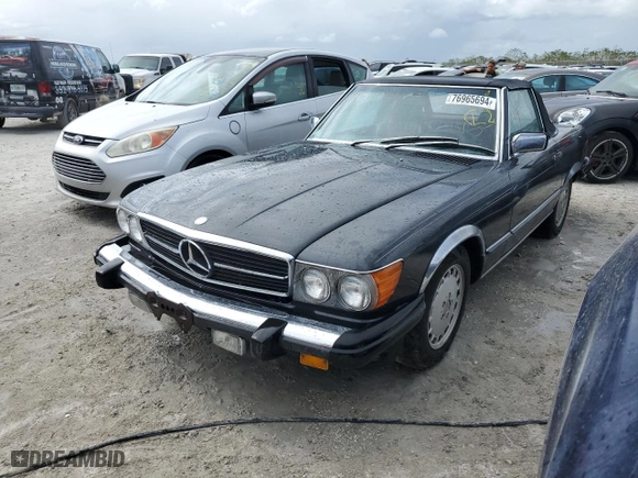 1987 Mercedes-Benz 560 Series 560SL with VIN WDBBA48D9HA060044, listed as a Copart auction lot 76965694 with NaN miles and Non Repairable. Bid and sale history available at carsss.com. Image 1.