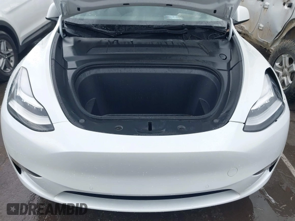2022 Tesla Model Y Long Range with VIN 7SAYGDEE6NF461788, listed as a IAAI auction lot 41697064 with 34,034 mi miles and . Bid and sale history available at carsss.com. Image 10.