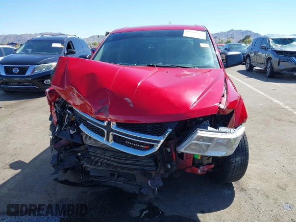 2015 Dodge Journey SE z VIN 3C4PDCAB9FT587668, wystawiony jako IAAI lot #41868556 z przebiegiem 99 695 mil mil oraz . Historia ofert i sprzedaży dostępna na DreamBid. Obrazek 6.