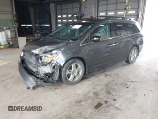2011 Honda Odyssey Touring с VIN 5FNRL5H90BB025855, выставлен на аукционе IAAI как лот 42104979 с пробегом 165 010 миль миль и . История ставок и продаж доступна на DreamBid. Изображение 18.