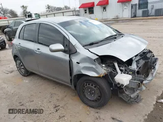 2010 Toyota Yaris with VIN JTDKT4K33A5314776, listed as a IAAI auction lot 41570383 with 167,428 mi miles. Bid and sale history available at carsss.com. Image 1.