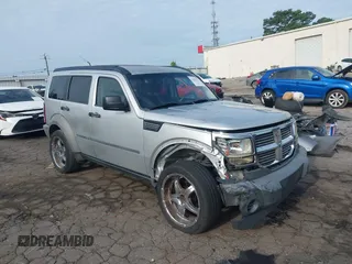 2007 Dodge Nitro SXT with VIN 1D8GU28K37W562598, listed as a IAAI auction lot 42491176 with 202,676 mi miles and . Bid and sale history available at DreamBid. Image 1.