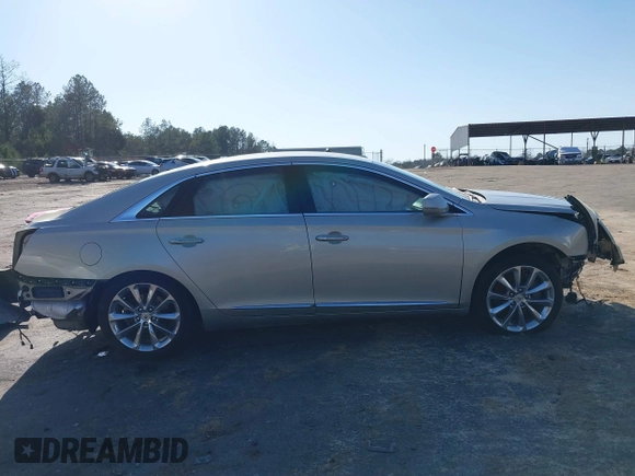 2013 Cadillac XTS Luxury with VIN 2G61P5S39D9172708, listed as a IAAI auction lot 41781371 with 100,173 mi miles. Bid and sale history available at carsss.com. Image 14.