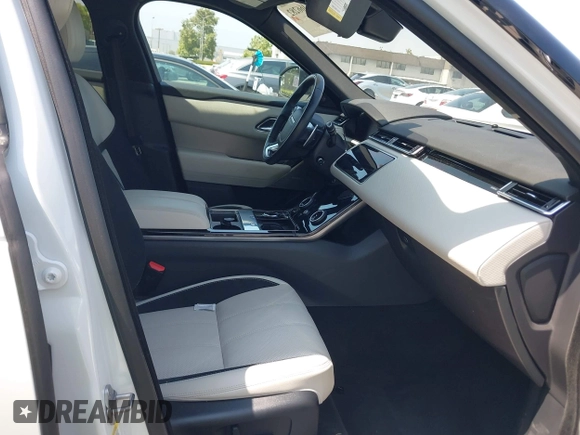 2018 Land Rover Range Rover Velar R-Dynamic SE z VIN SALYL2RX1JA747276, wystawiony jako IAAI lot #42466282 z przebiegiem 51 011 mil mil oraz . Historia ofert i sprzedaży dostępna na DreamBid. Obrazek 5.