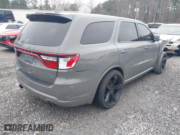 2021 Dodge Durango GT Plus with VIN 1C4RDHDG8MC639748, listed as a IAAI auction lot 41623021 with 104,686 mi miles and . Bid and sale history available at DreamBid. Image 4.