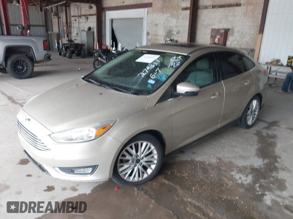 2017 Ford Focus Titanium with VIN 1FADP3J26HL279839, listed as a IAAI auction lot 42466826 with 202,795 mi miles and . Bid and sale history available at DreamBid. Image 2.