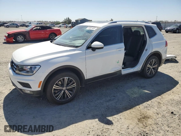 2019 Volkswagen Tiguan SE with VIN 3VV2B7AX5KM009947, listed as a Copart auction lot 54951455 with 90,569 mi miles and Salvage Title. Bid and sale history available at DreamBid. Image 1.