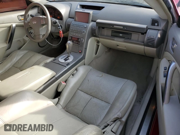 2003 Infiniti G35 w/Leather z VIN JNKCV54E93M218435, wystawiony jako Copart lot #41665965 z przebiegiem 131 987 mil mil oraz Szkoda całkowita • Salvage title. Historia ofert i sprzedaży dostępna na DreamBid. Obrazek 8.