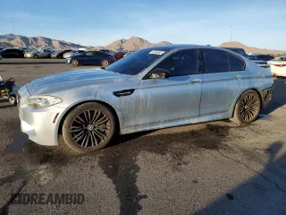 2013 BMW M5 with VIN WBSFV9C58DD096751, listed as a Copart auction lot 85451614 with 76,576 mi miles and Salvage Title. Bid and sale history available at carsss.com. Image 1.