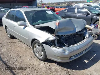2004 Toyota Avalon XL with VIN 4T1BF28B34U376467, listed as a IAAI auction lot 41883436 with 183,114 mi miles. Bid and sale history available at carsss.com. Image 1.