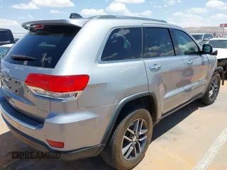 2018 Jeep Grand Cherokee Limited with VIN 1C4RJEBG9JC369953, listed as a IAAI auction lot 42174372 with 125,660 mi miles and . Bid and sale history available at DreamBid. Image 4.