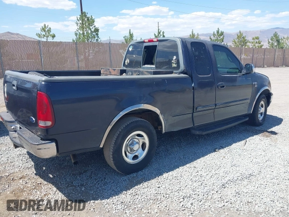 2001 Ford F-150 XL with VIN 1FTRX17L41NA08695, listed as a IAAI auction lot 42558909 with 267,203 mi miles and . Bid and sale history available at DreamBid. Image 4.