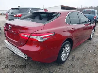 2020 Toyota Camry LE with VIN 4T1C11AK1LU359477, listed as a IAAI auction lot 41800546 with 109,319 mi miles and . Bid and sale history available at DreamBid. Image 4.